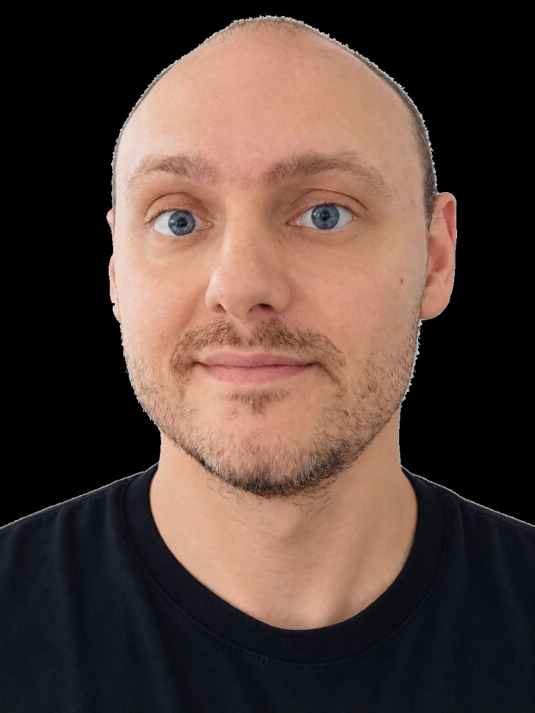 Aleksandr Vasilev — professional headshot, AI Systems Architect and founder of AgentStack